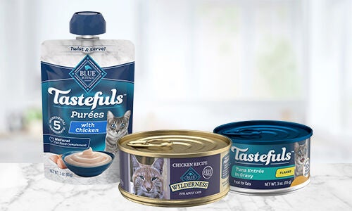Image of two cans of wet cat food and one Tastefuls cat food pouch